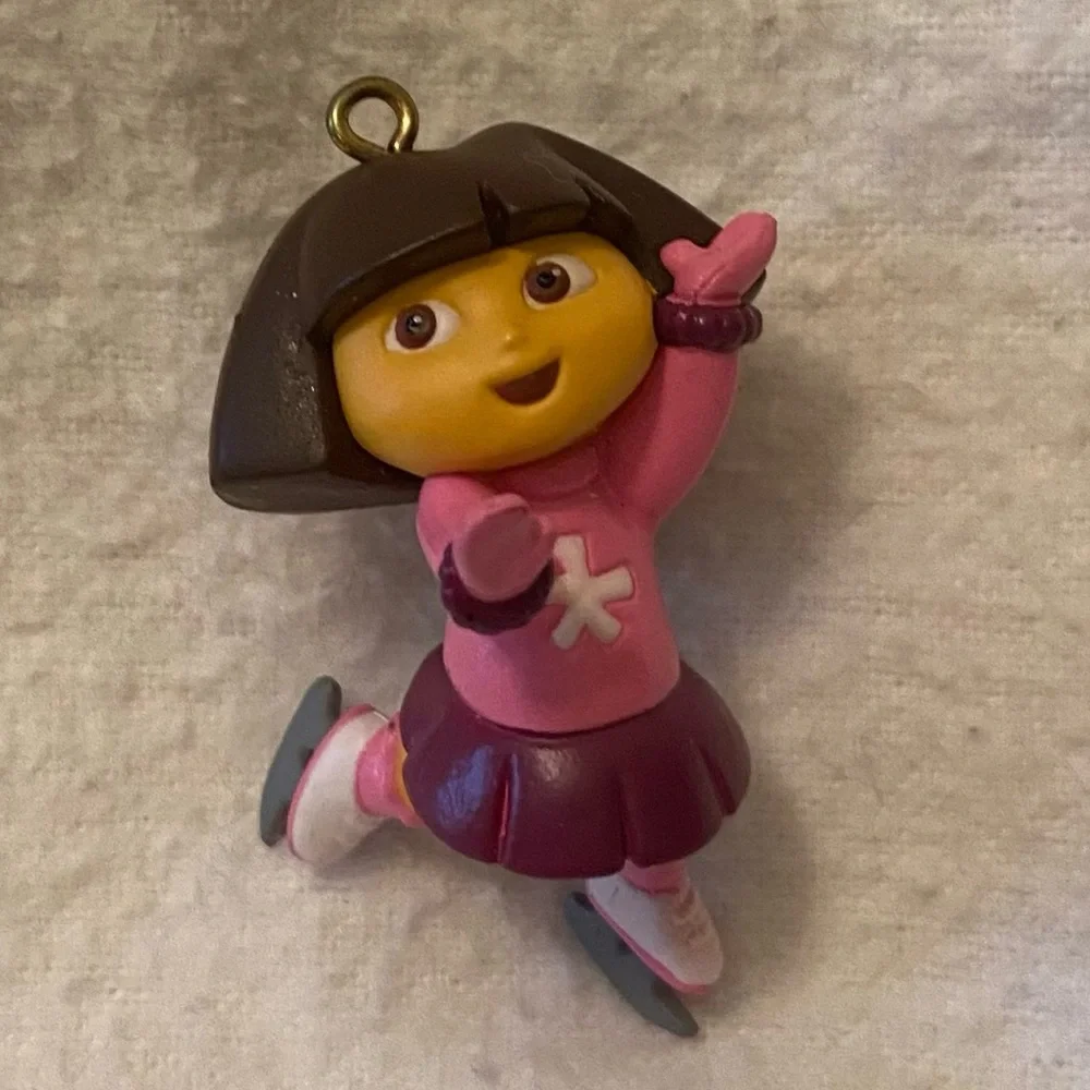 Go Diego and Dora holiday ornament characters with boots, swiped and Santa too!